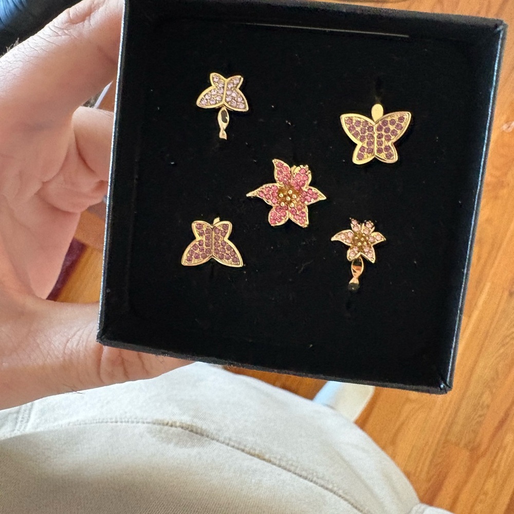 The Mariah Carey Collection Set of 4 Flower and Butterfly rings. Sz 5 brand new